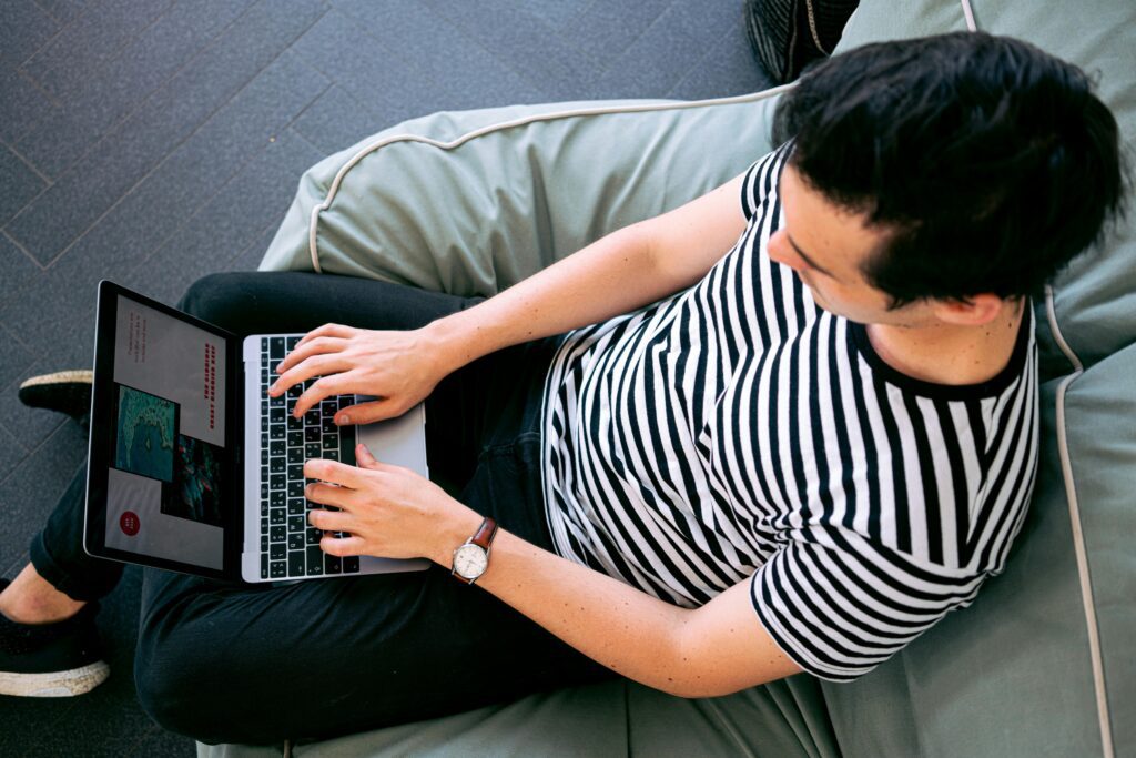 3 Man working on authentic content at a web design agency Singapore to engage online audiences