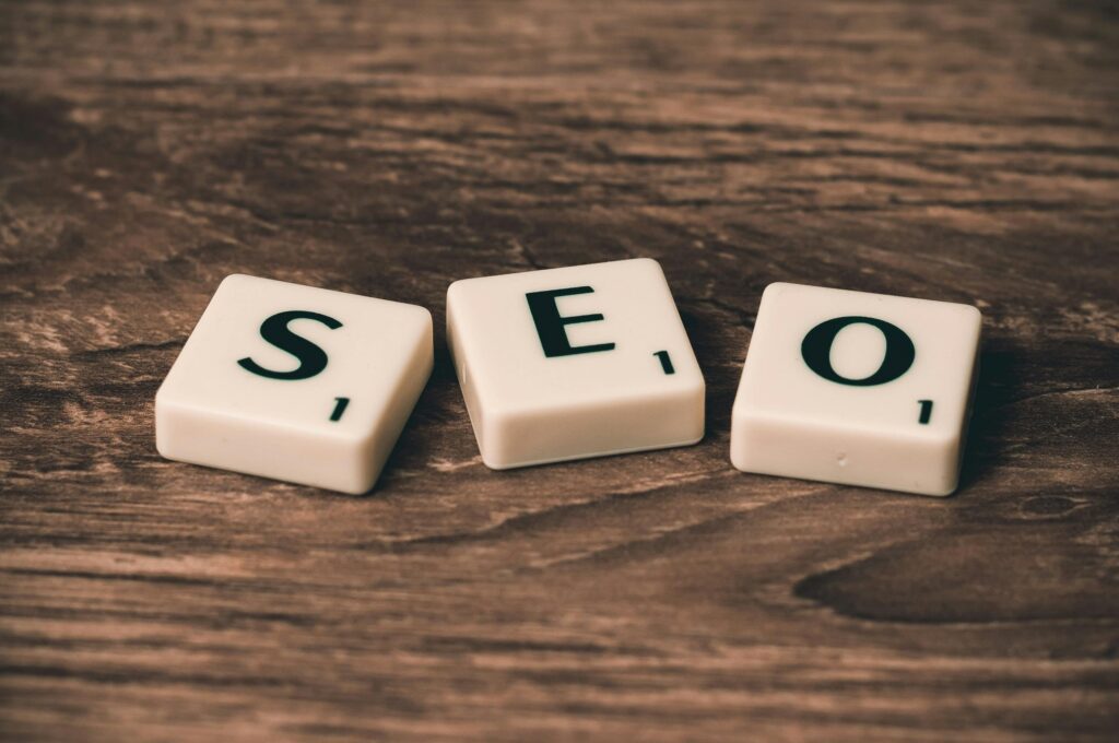 Scrabble tiles symbolising subtle SEO tactics implemented by a website design agency in Singapore