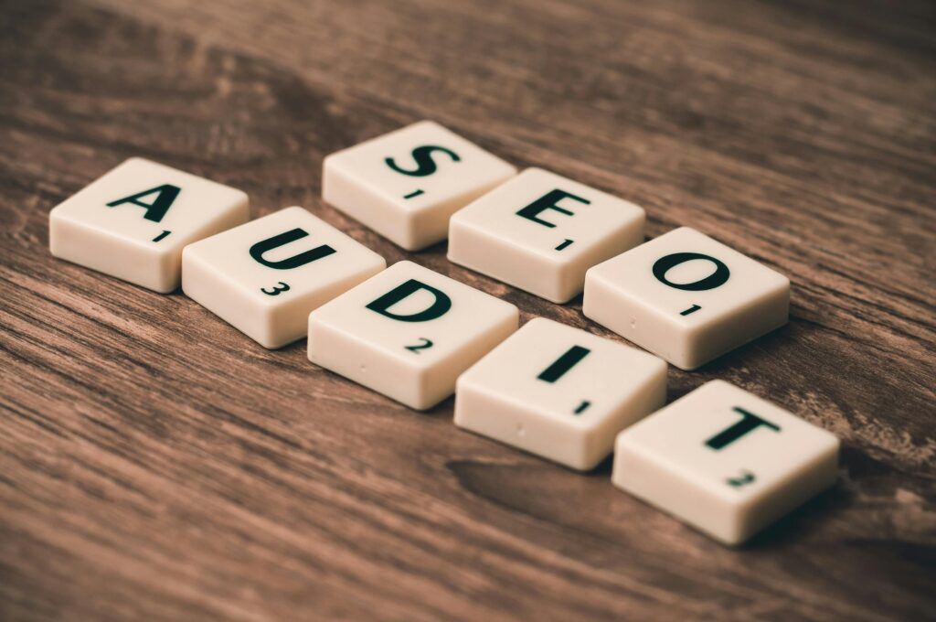 SEO audit blocks on a table representing analysis performed by a website design agency in Singapore