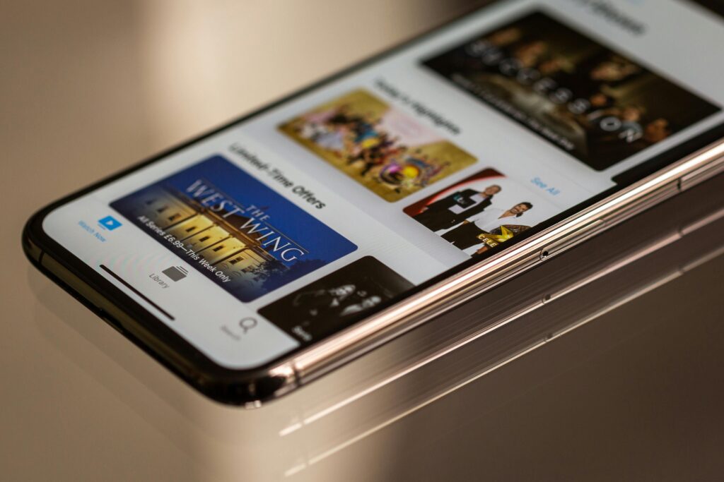 Close-up of smartphone reflecting brand loyalty tactics used by web design firms