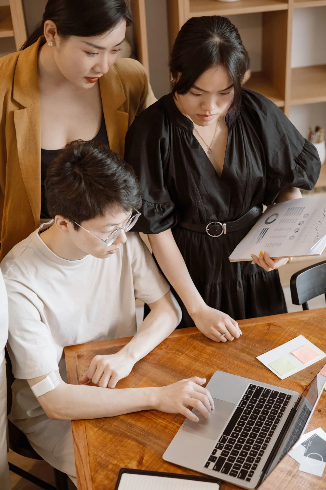 Marketing team planning website content around customer questions and search intent. 